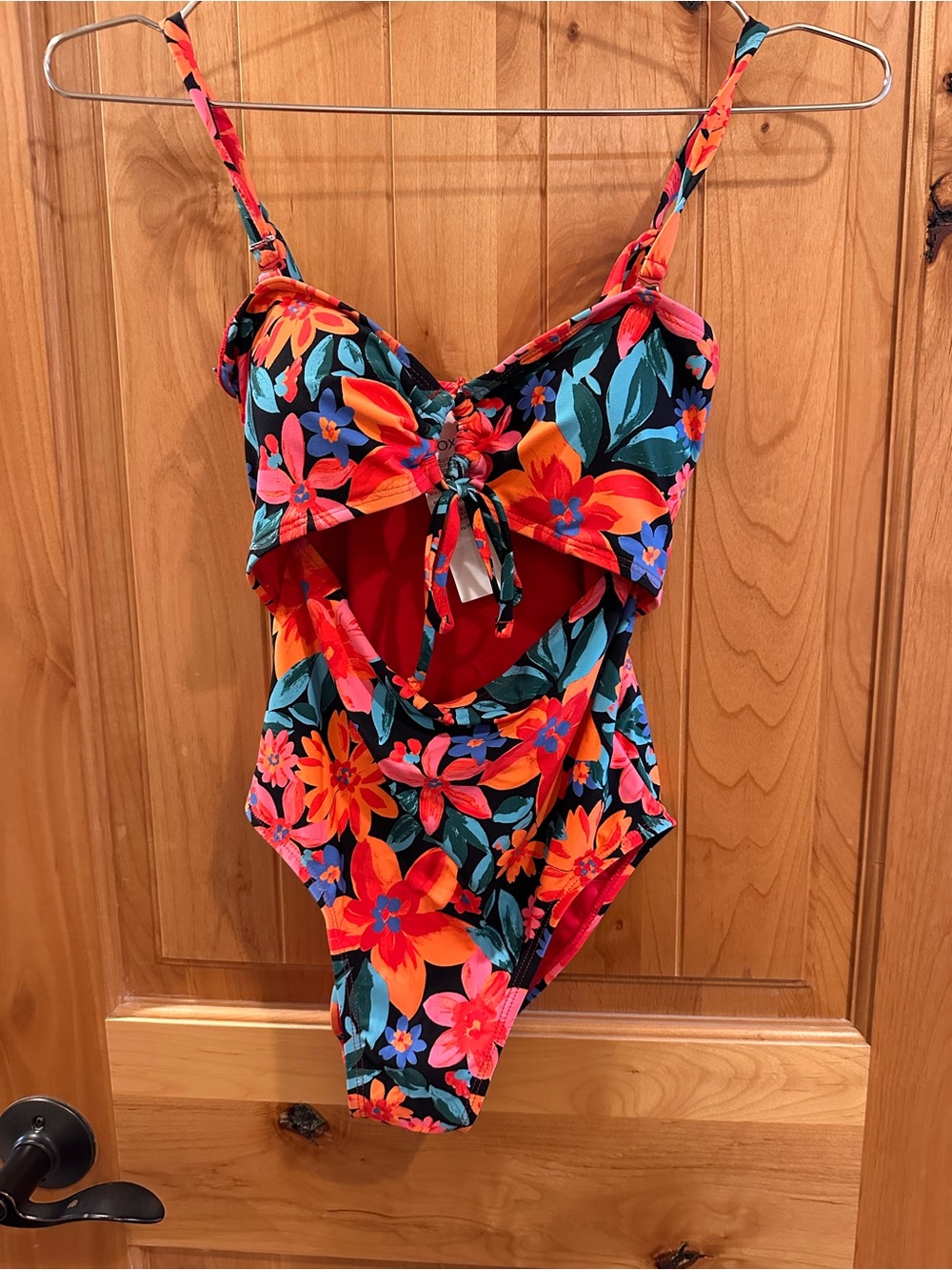 Roxy women’s Floral One-Piece Swimsuit in Black with Orange, Pink & Teal Flower